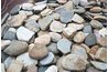 Use any variety of small decorative rocks