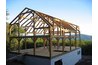 A barn framework, courtesy of Vermont Timber Works Inc.