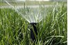 Place Flower Pots Under Sprinkler System