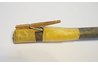 Clothes pin taped to the end of a stick