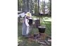 Boiling laundry over an open fire.