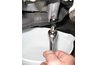 Unscrew the oil plug