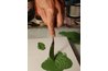 Sgraffito technique, or scraping off paint using the tip of a palette knife