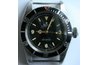 An early Rolex Submariner, also known as the James Bond watch.