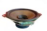 A speaker uses an electrical signal to vibrate a cone, thus producing sound.