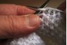 Each line of knitting should transfer the loops onto the opposite needle.
