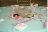 A beautiful table topper creates a focal point in the room.