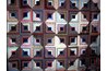 Traditional patchwork quilt patterns were prized for using up fabric scraps