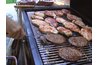 Hire a caterer to provide barbecue food for attendees.