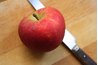 Transform a firm apple into a pipe.