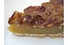 Pecan pie consists of pecans and a sweet, corn syrup filling baked in a pie shell.