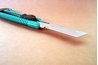 Score the plastic with a utility knife