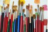 Bring out the facial features on the face mold by adding paint.