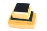 Heavy-grit sandpaper or a sanding belt are appropriate to sand the Corian.