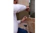 Tiles are applied traditionally but using mastic instead of mortar.