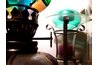 Fuel bowl, collar, burner and wheel adjuster of a kerosene lamp can all come apart.