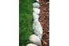 Edges are nicely defined with the use of ornamental stones.