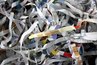 Tear newspaper into strips for paper mache.