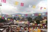 Papel picado banderitas suspended during a Mexican celebration.