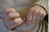 Keep fingernails trimmed to prevent nail splitting.