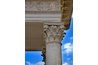 Corinthian columns have acanthus leaves in addition to the volutes.