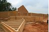 The building materials in a house kit often come preassembled.
