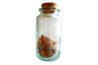 Press the coconut meat over a jar.