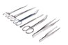 Forceps, scapals or tweezers can be used for debridement.