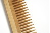 Comb hair with a wide tooth comb.