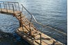 Pontoon deck bridge for floating dock