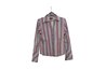 Choose a fitted button-down blouse with stripes going up and down to slenderize.