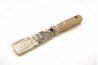 Putty knives are useful for restoring old glazing compound as well as applying softened product.