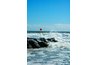 A red flag indicates a variety of hazards in the surf.