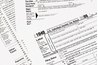 Separate the regular hours worked from the overtime since different pay rates apply.