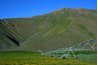 Center pivot systems are used to irrigate flat terrain.