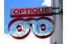 An optician measures your face to assist you with the perfect fit.