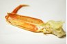 There's an art to breaking open the legs of the snow crab.