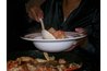 Gumbo is a traditional New Orleans dish that is often part of Mardi Gras suppers.
