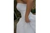 Measure across the bodice top edge or the waistline.