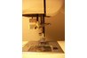 Set your sewing machine to the widest zigzag setting.