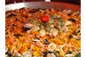 Paella is a flavorful, slow cooked dish.