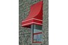 A bright, colorful awning can spruce up a plain, uninviting home.