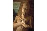 A carving of an ancient Egyptian pharaonic crown.