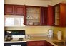 Wooden cabinets can support plate racks.