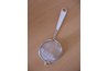 Use a sieve to strain the tea.