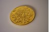 Fake doubloons are a traditional Mardi Gras gift.