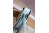 Check to be sure the wire is over the wheel of the pulley.