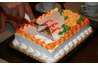 Bake, decorate and slice two birthday cakes for an Everything in Pairs party.