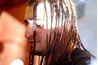 The traditional style of braided hair extensions.
