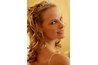 Luscious curls and a sparkly tiara will make you look like a princess.